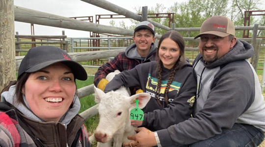 Wirstuk family with charolais calf